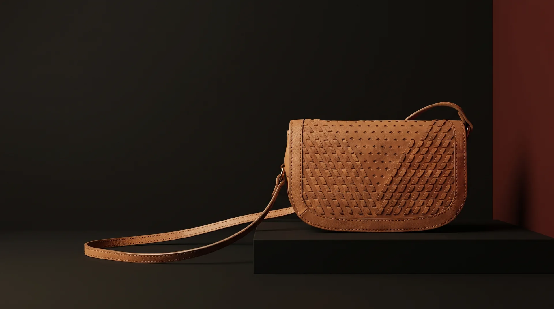 Hide Fashion Tan Woven Leather Saddle Crossbody, a factory-developed style photographed in the studio